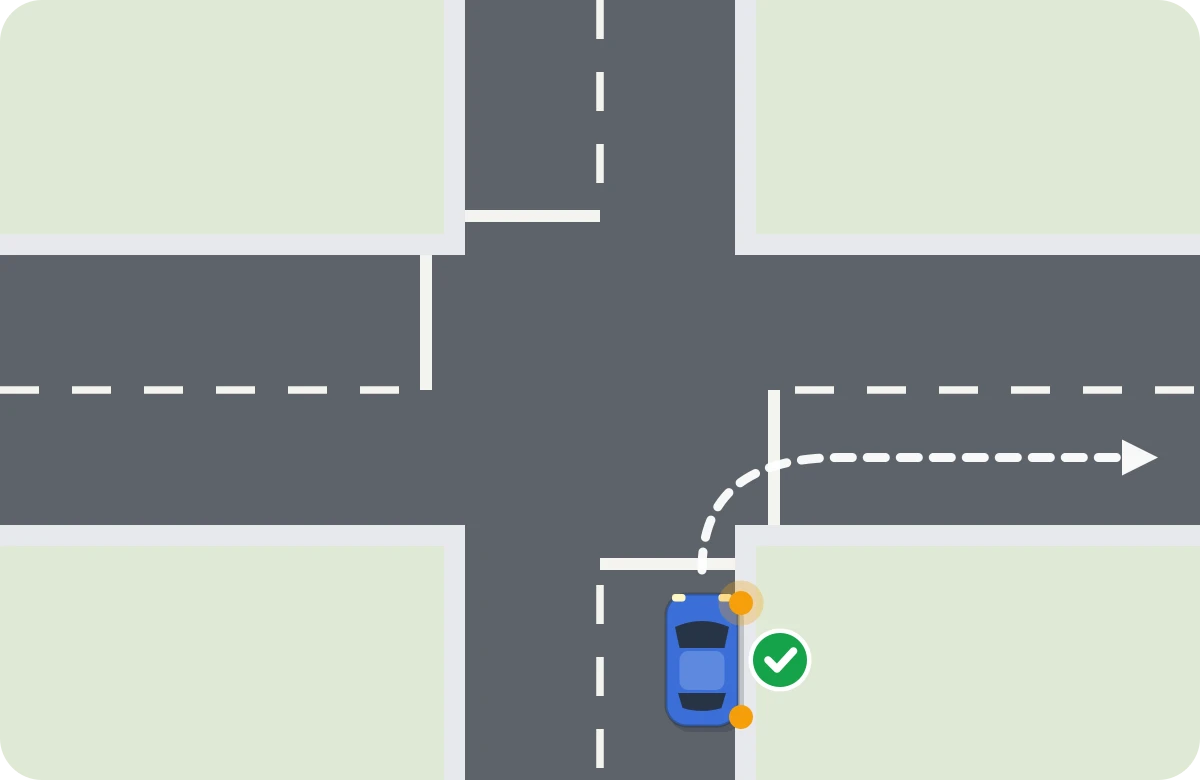 Giro a la derecha: el coche se pega al borde derecho y gira cerrado, sin abrirse hacia el centro.