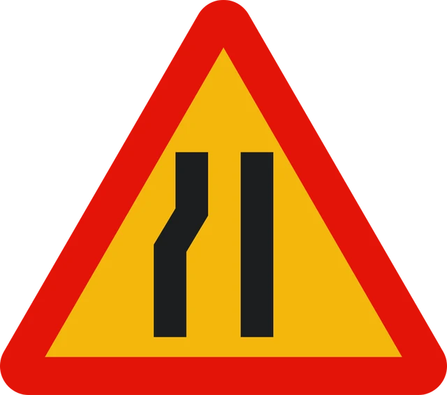 Road narrows on left ahead (roadworks)