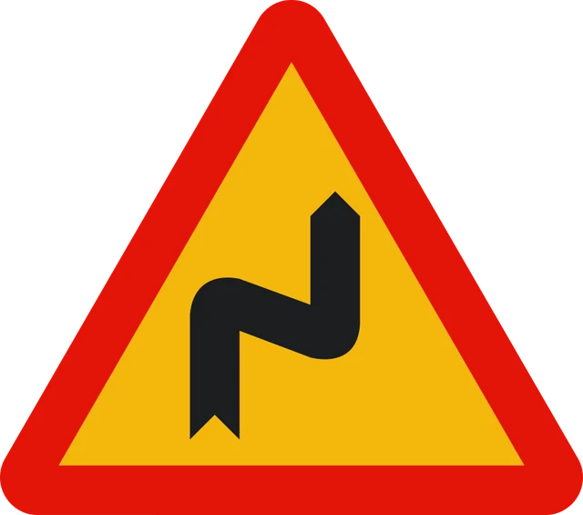 Double bend or series of bends ahead, first to the right (road works)