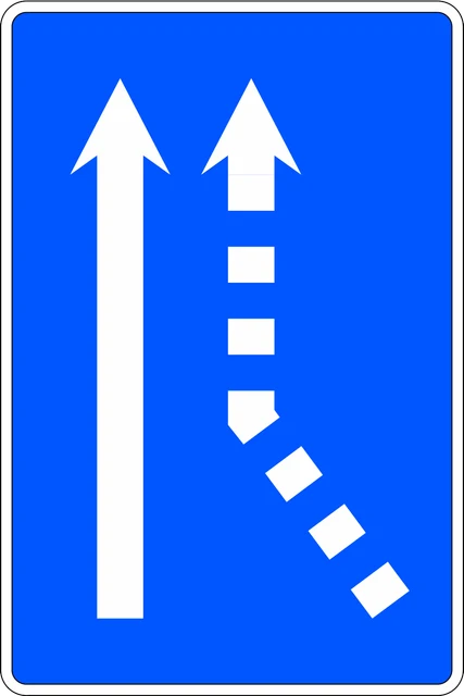 Traffic merges from the right onto a single-lane carriageway