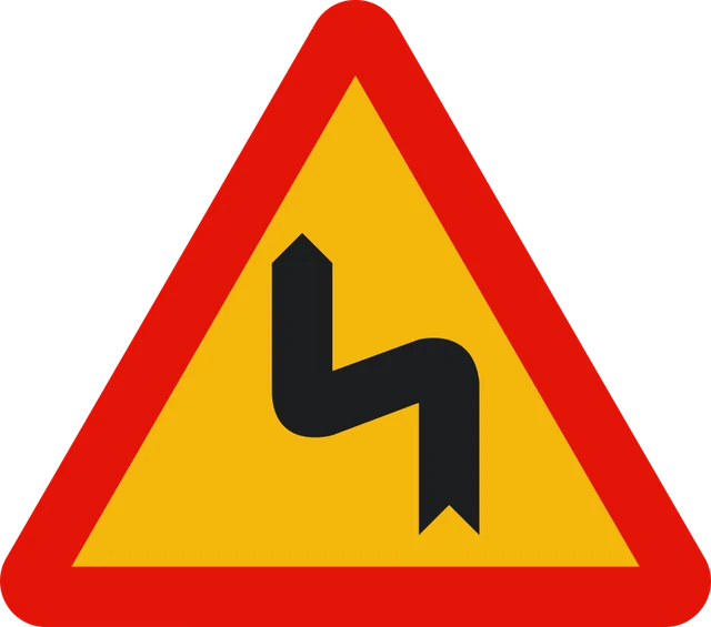 Double bend ahead, first to the left (roadworks)