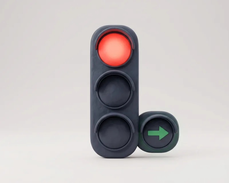 Traffic light with supplementary green filter arrow alongside a red light